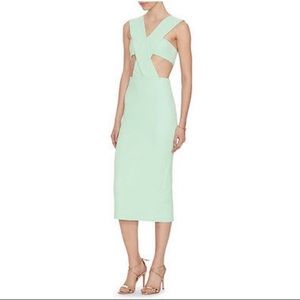 Cushnie Et Ochs stretch caddy cut out bow back cocktail dress.